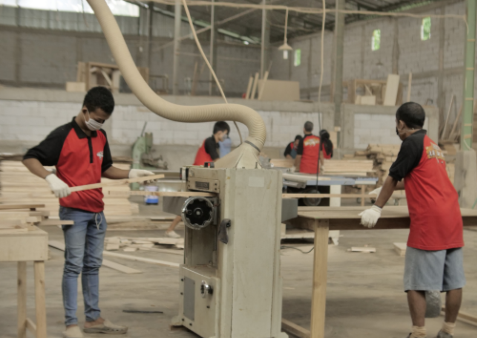 Skilled craftsmen producing premium teak furniture in our Indonesia teak furniture factory
